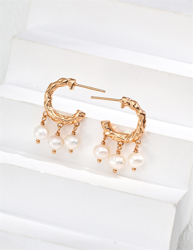 Boucles d'oreilles pendantes élégantes en perles naturelles