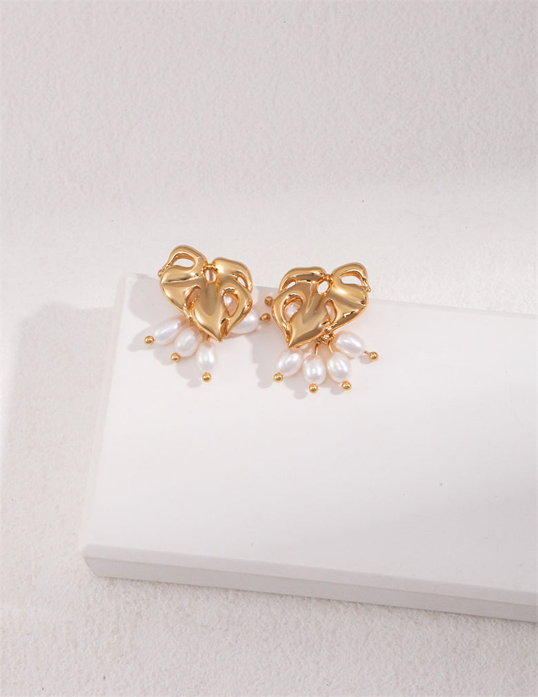 Boucles d'oreilles pendantes en perles de riz et feuilles de Monstera tropicales