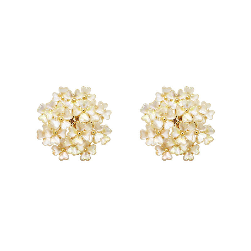 Boucles d'oreilles à tige en coquillage et zircon