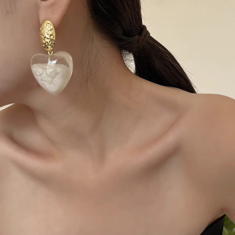 gold heart-shaped earrings for women