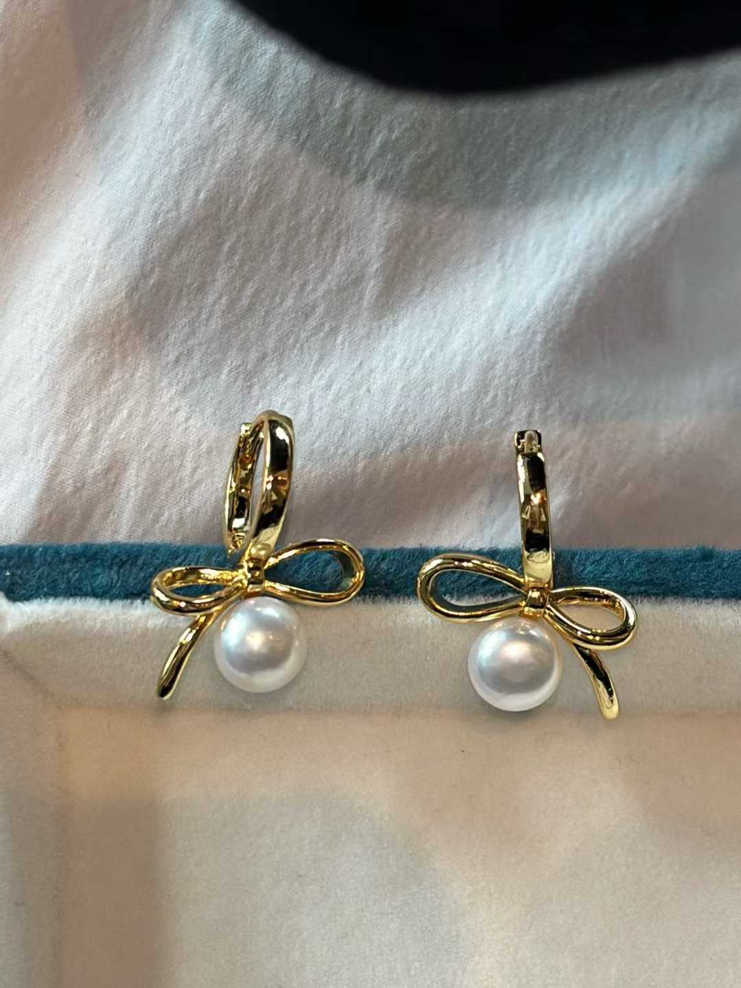 Natural Freshwater Pearl Bow Earrings in Gold/Silver