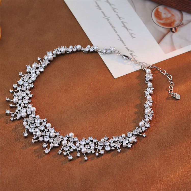 Collier de perles célestes avec nœud en zircon