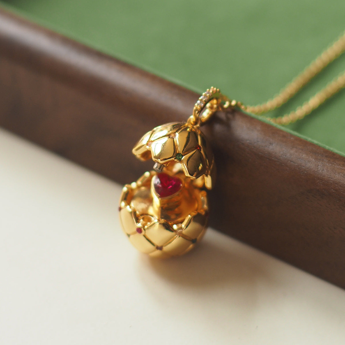 Vintage Lattice Egg Pendant Necklace with Heart Gem – Gold-Plated, Openable Design