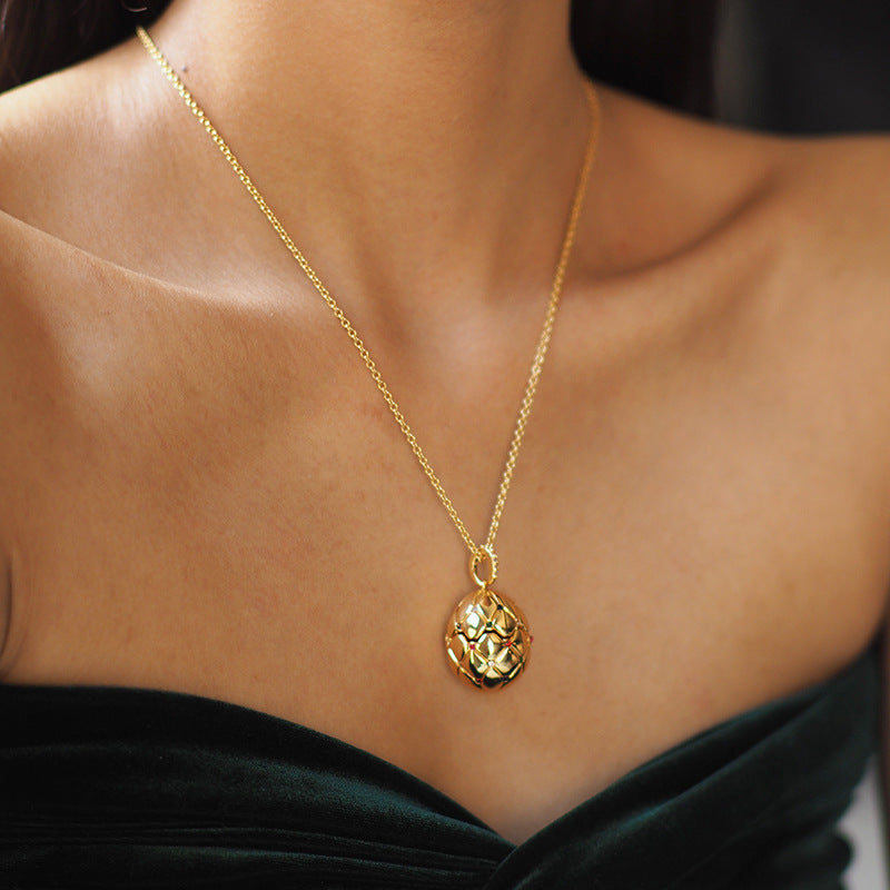 Vintage Lattice Egg Pendant Necklace with Heart Gem – Gold-Plated, Openable Design