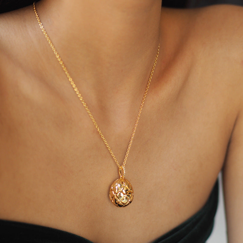 Vintage Lattice Egg Pendant Necklace with Heart Gem – Gold-Plated, Openable Design