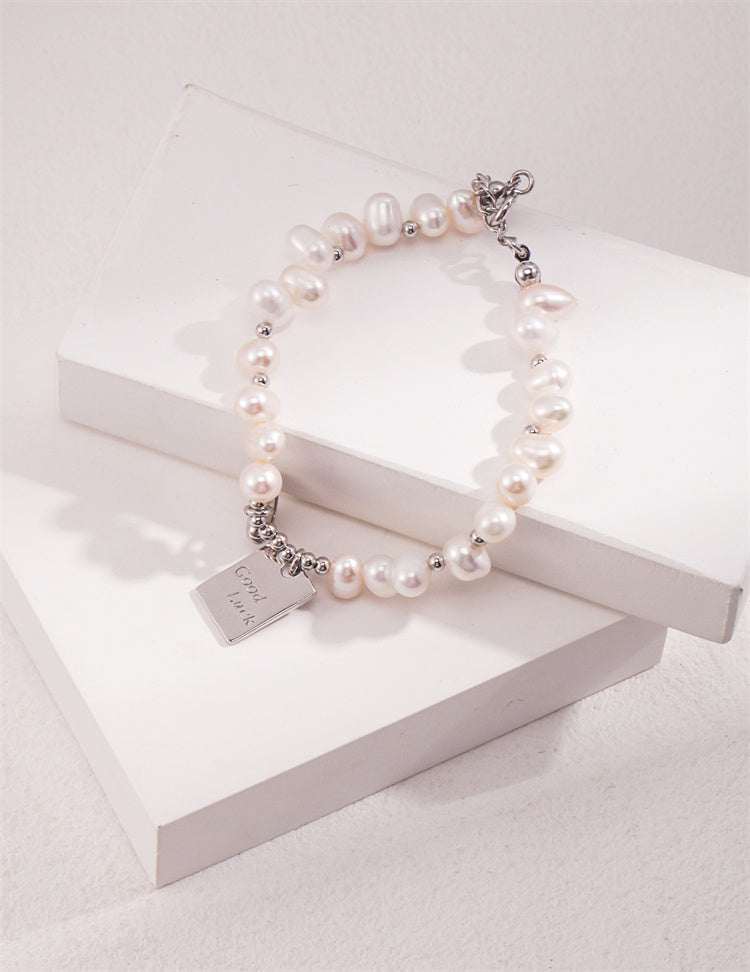 S925 Silber Reisperlenarmband mit Glücksbringer &amp; Herz