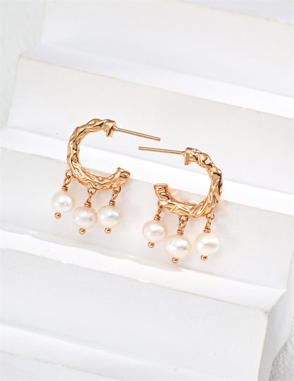 Boucles d'oreilles pendantes élégantes en perles naturelles