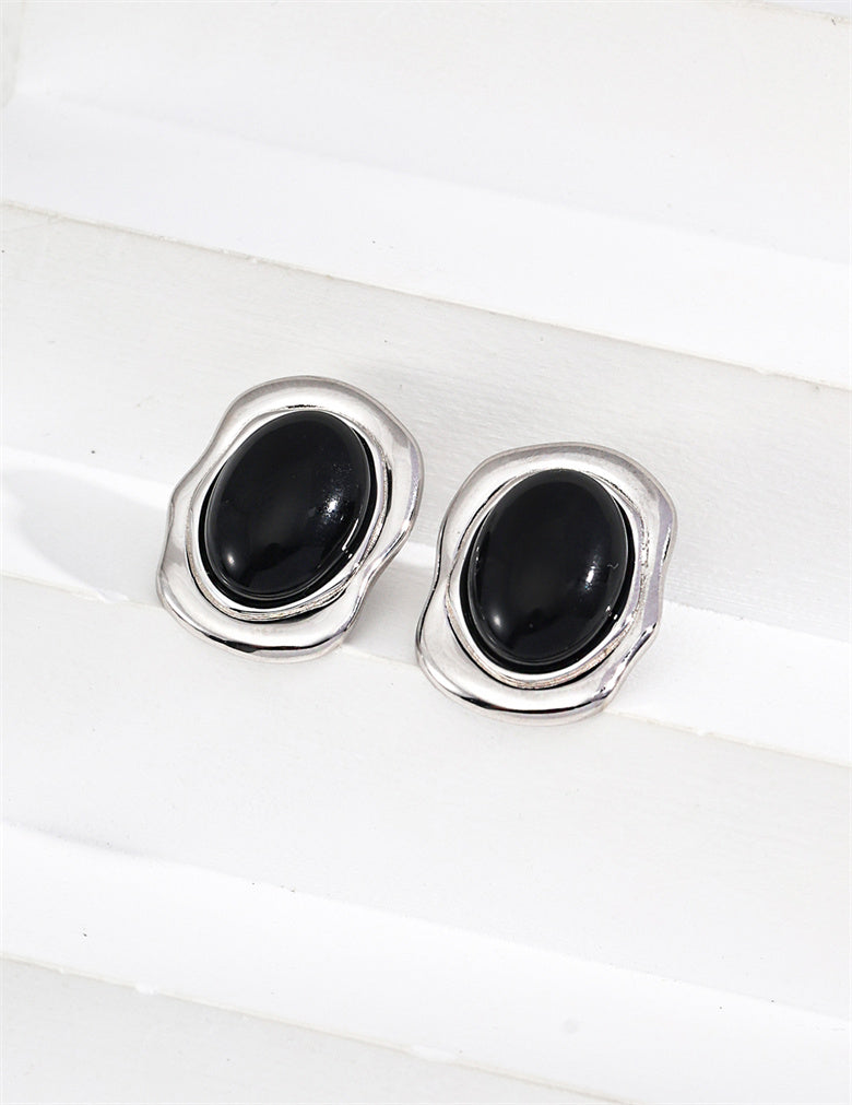 Minimalistische ovale Ohrstecker aus schwarzem Onyx/Perlmutt