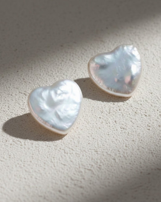 Heart-shaped pearl earrings