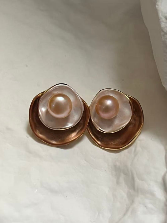 Pair of peach pearl earrings