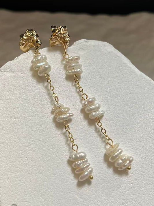 chunky gold and stick Pearl long drop  earrings 