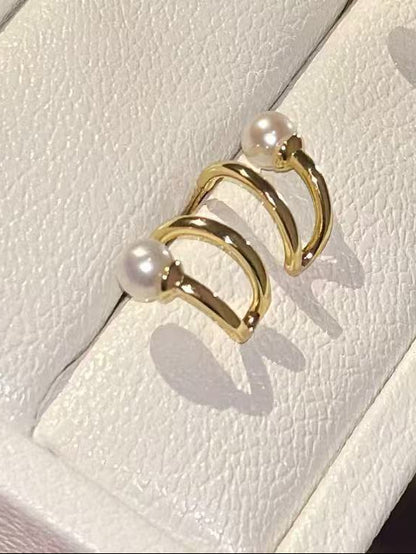 Gold earrings with pearls for wedding