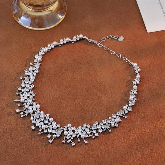 Celestial Pearl Necklace with Zirkon Bow