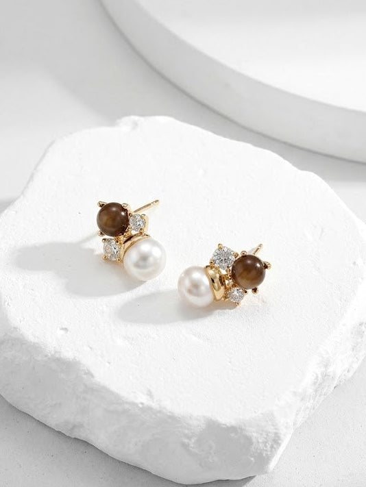 pearl and diamond stud earring with tiger's eye