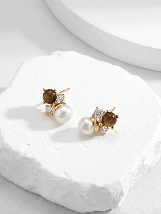 pearl and diamond stud earring with tiger's eye
